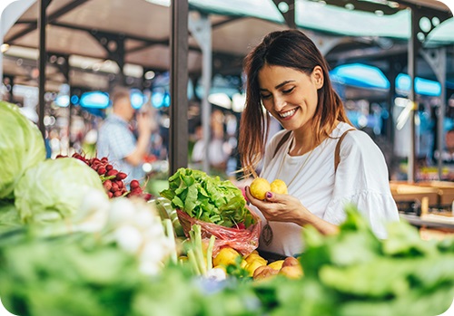Woman Examining Produce