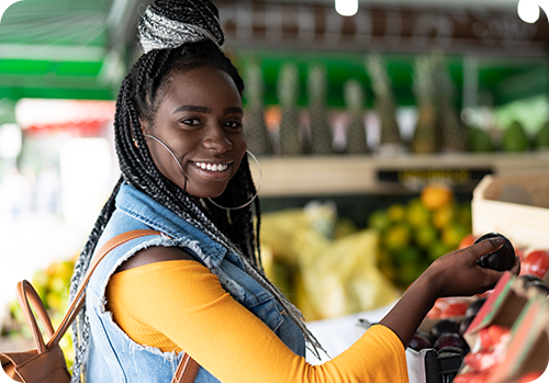 Smiling woman at market