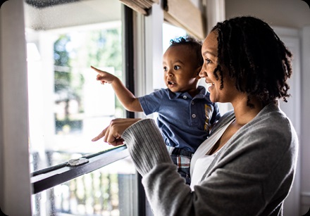 Family looking out window