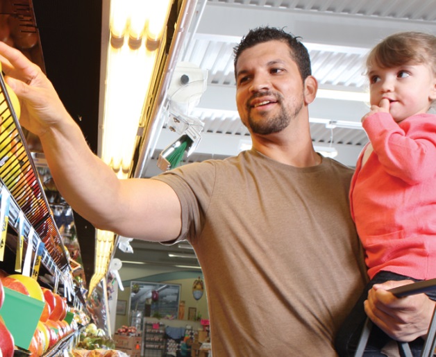 Toddler eating an avacado